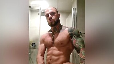 Bold Tattooed Jock Flexing In Bathroom And Jerking Massive Cock