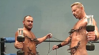 Colin Steele And Jessie Balboa Pinch Each Other With Pegs