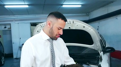 Suited Car Mechanic