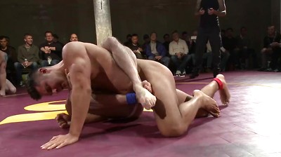Four hot studs fight for the right to fuck in front of a live crowd!