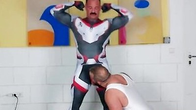 Muscle Daddy - Muscle Man Tries On Spandex Cosplay Suit With The Help Of His Muscle Stepdaddy