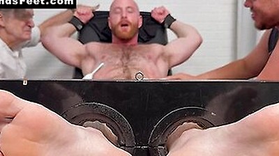 Brody Meyer In The Tickle Chair With An Electric Toothbrush On Balls